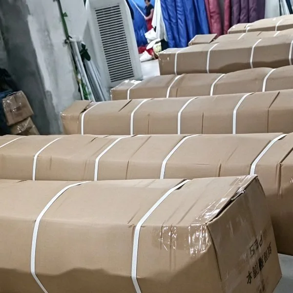 Finished cartons strapped and staged before container loading