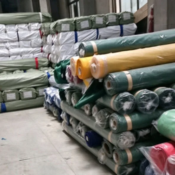 Dyed canopy fabric rolled and banded in stock, waiting for the cutting table