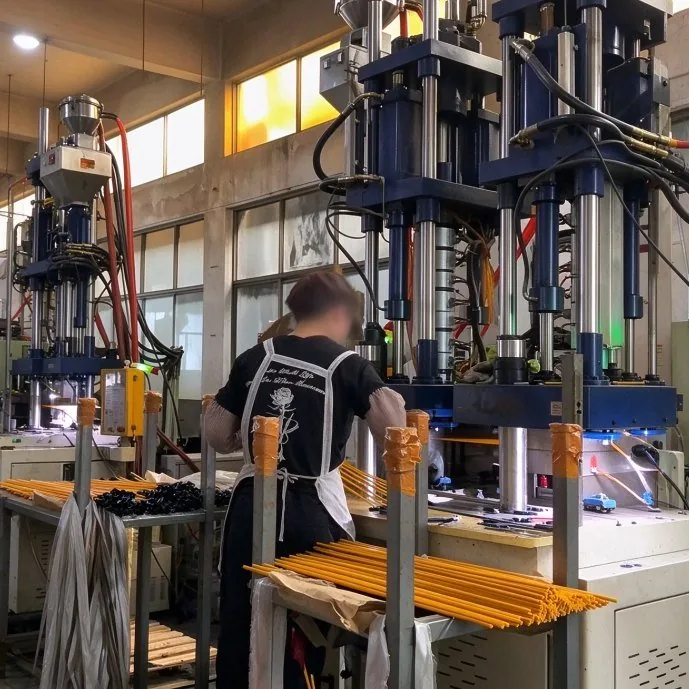 Frame components being cut, drilled and formed before assembly