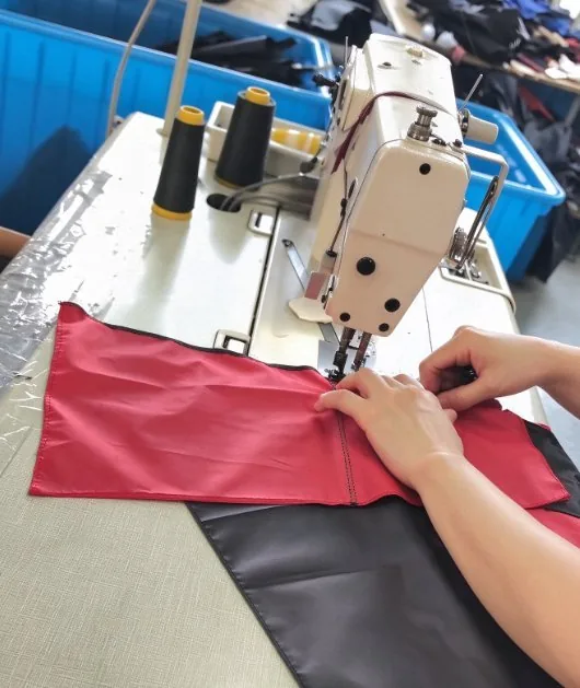 Industrial sewing machine joining two-tone canopy panels