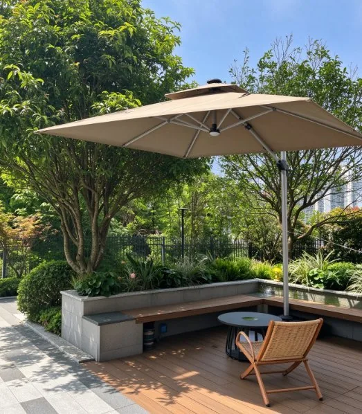 Cantilever umbrella beside a wooden bench and planted border