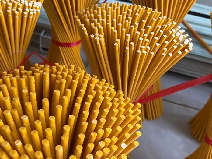 Umbrella ribs bundled in dozens on a workshop floor in the Songxia cluster