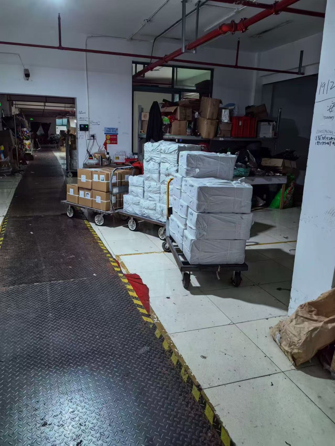 Packed cartons of custom umbrellas in the dispatch area
